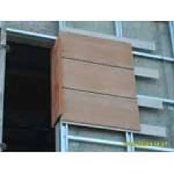 Wood-patterned facade cladding.