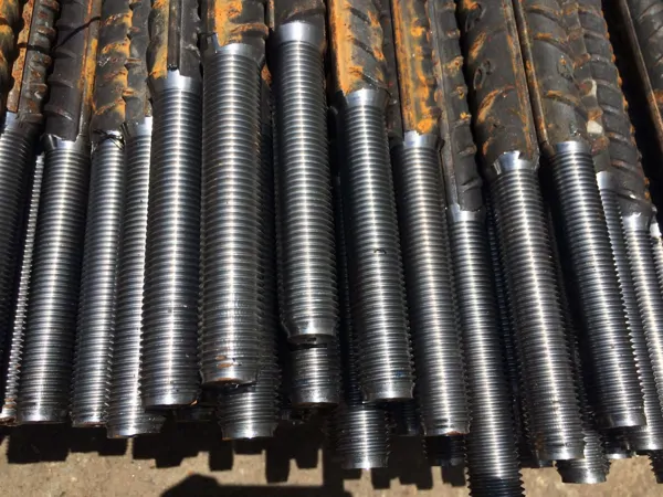 threading, cutting into rebar