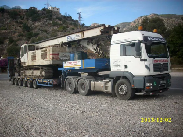 Pile driving machine transportation