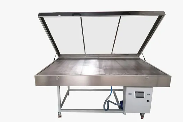 HEATED VACUUM TABLE