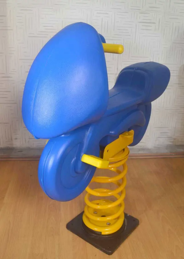 Spring-loaded Toy Motorcycle